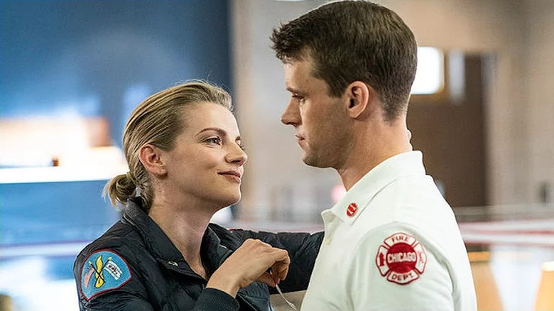 Kara Killmer as Sylvie Brett and Jesse Spencer as Matt Casey facing each other on Chicago Fire