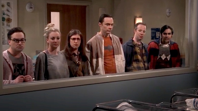 Howard and Bernadette's friend try to pick out their new baby, Halley, in the hospital nursery