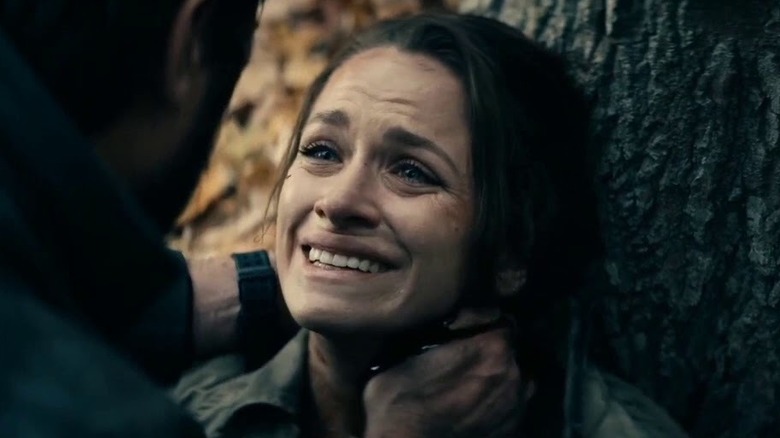 Rebecca Butcher looking up at Billy and crying