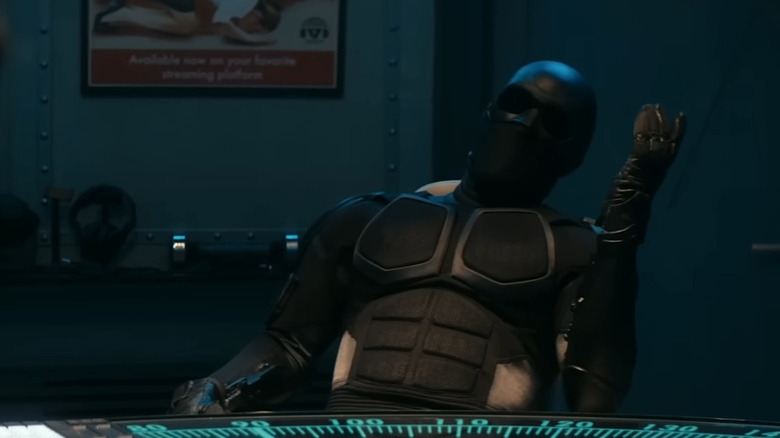 Black Noir II, leaning back in his podcast studio