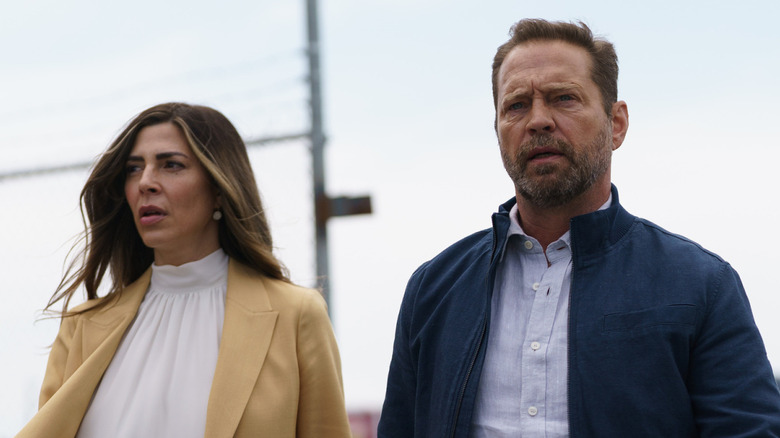 Private investigators Matt Shade and Angie Everett