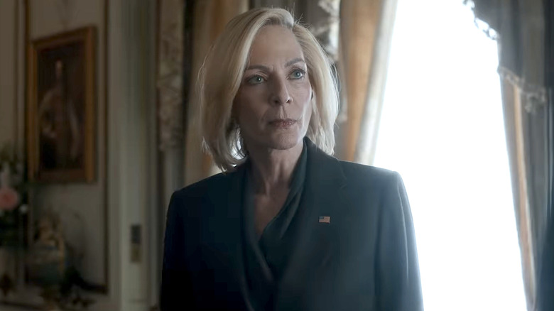 President Grace Penn in black standing in front of a bright window