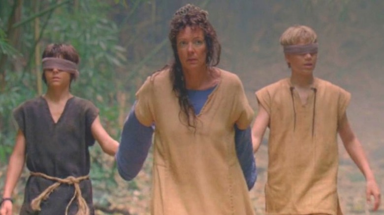 Allison Janney as Mother leading two blindfolded boys on Lost