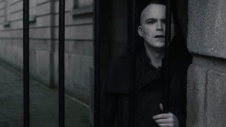 the Creature looks through iron bars in "Penny Dreadful" (2014)