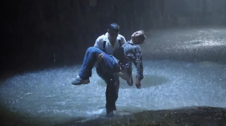 George Clooney's Doug Ross carrying Erik Von Detten's Ben in the water on ER