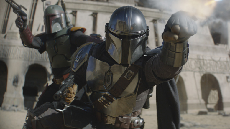 Boba Fett and The Mandalorian shooting things off-screen in The Book of Boba Fett