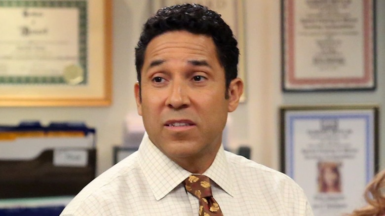 Oscar Nunez as Oscar Martinez, talking on The Office.