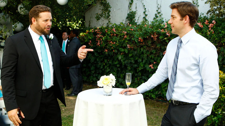 David Denman as Roy Anderson points at John Krasinski as Jim Halpert on The Office