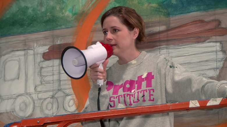 Jenna Fischer as Pam Beesly speaks into a megaphone on The Office