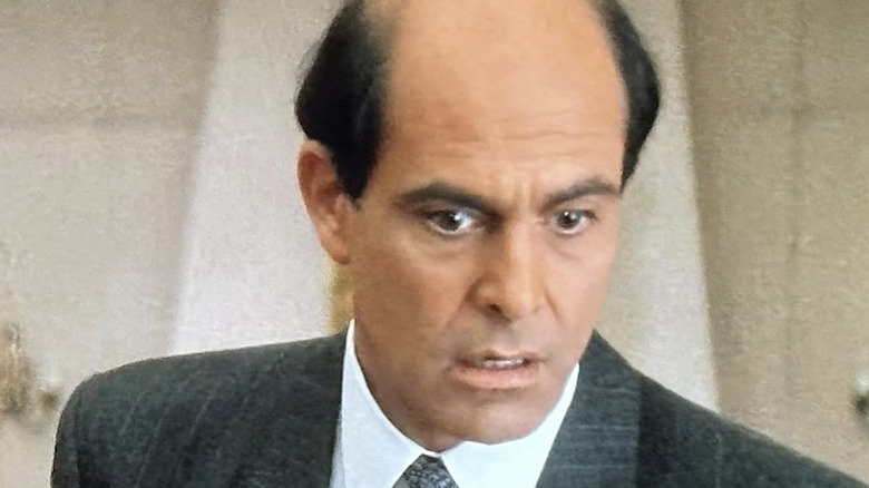 Douglas Brackman in a black and white suit in L.A. Law