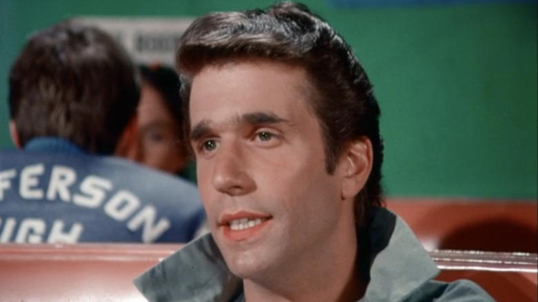 Fonzie sits in a booth at Arnold's Drive-In