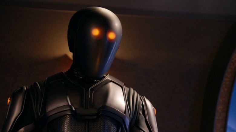 K-1 standing and staring on The Orville S3E7