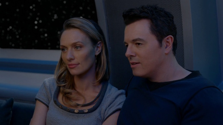 Janel and Ed sitting together and watching a movie on The Orville S2E4