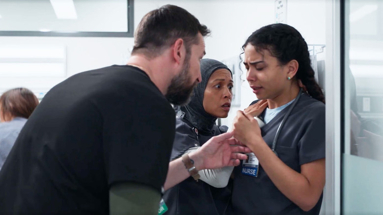 Dr. Robby and Perlah consoling Emma