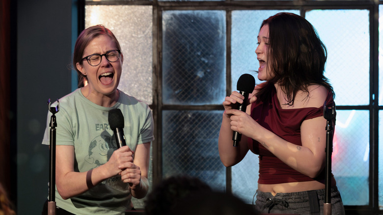 Taylor Dearden as Dr. Mel King and Isa Briones as Dr. Trinity Santos on The Pitt