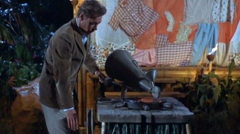 Thurston Howell operates the record player