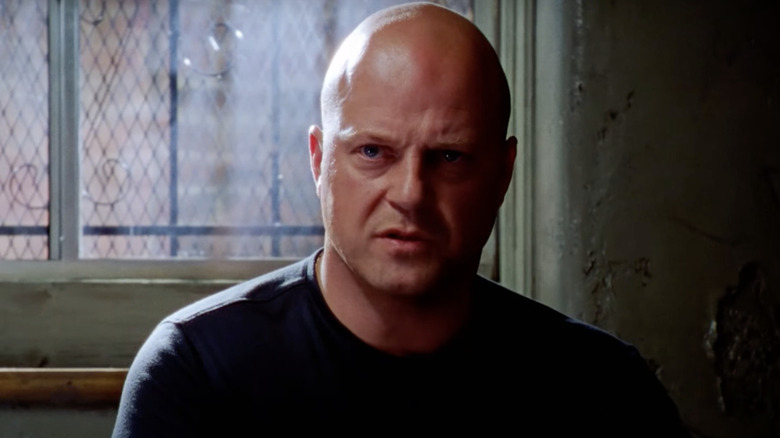 Mackey sitting in a dark room on "The Shield"