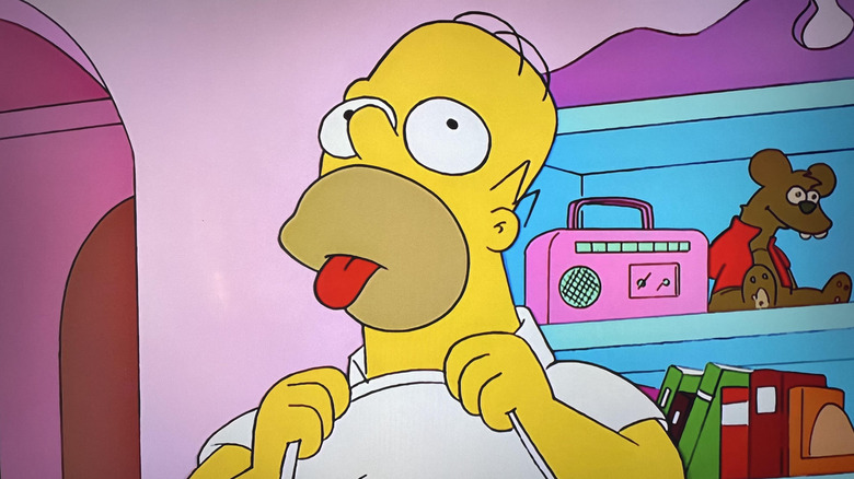 Homer Simpson licks his shirt on The Simpsons