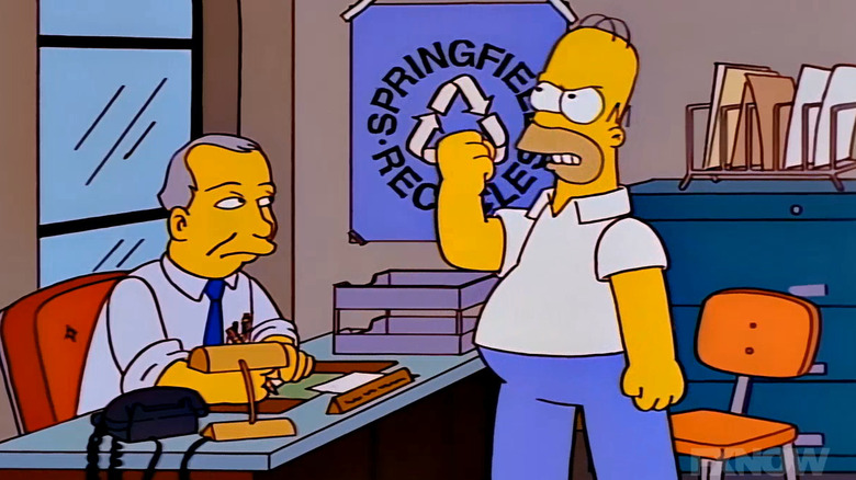 Ray Patterson stares at an angry Homer Simpson on The Simpsons