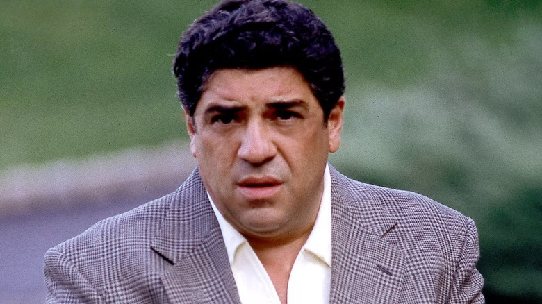 Vincent Pastore as Sal Bonpensiero, wearing a suit in The Sopranos.