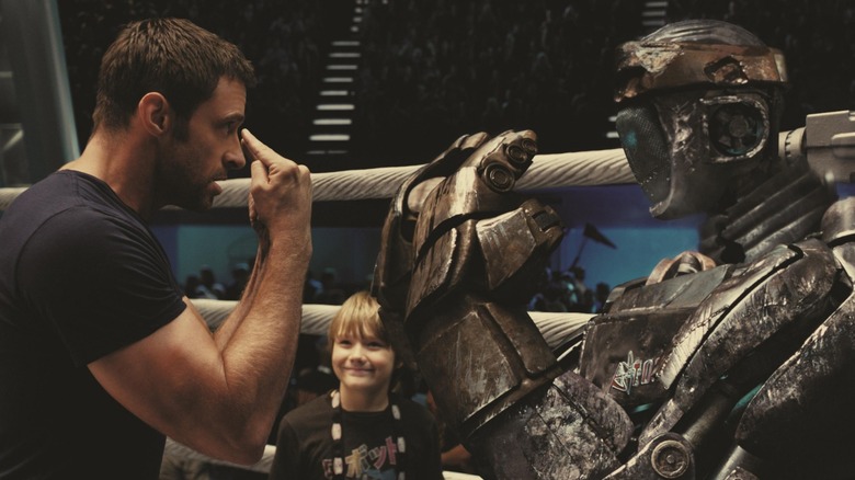 Hugh Jackman and his robot counterpart in the movie Real Steel