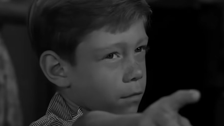 Anthony Fremont (Billy Mumy) torments his neighbors in The Twilight Zone, It's a Good Life