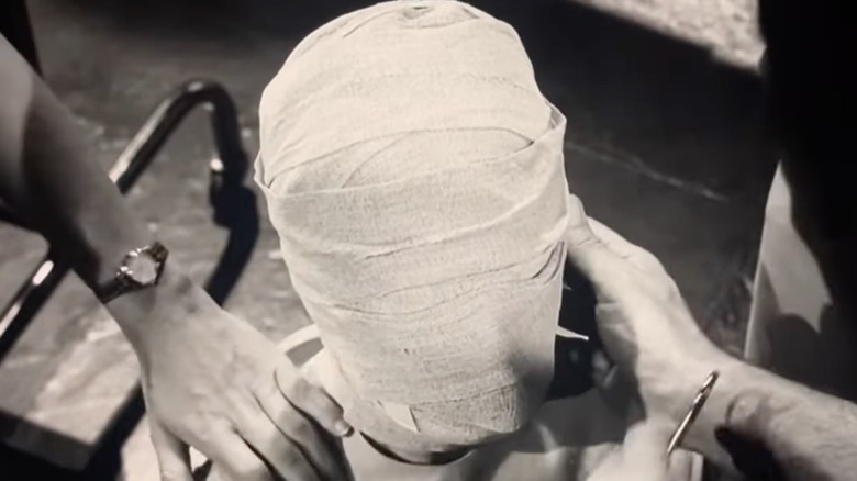 A plastic surgery patient anxiously awaits the removal of her bandage in "The Eye of the Beholder"