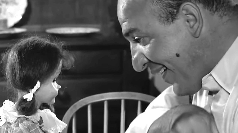 Stepfather Erich is taking his frustrations out on his stepdaughter's Talky Tina doll