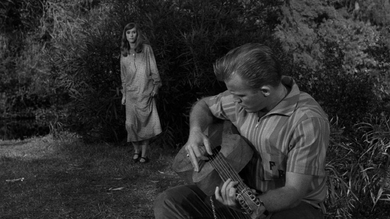 Mary Rachel watching Floyd Burney playing guitar on The Twilight Zone