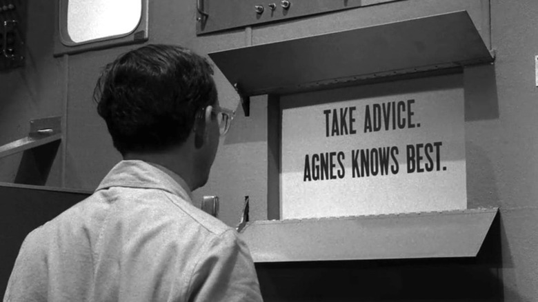 James Elwood looking at a message from Agnes on The Twilight Zone