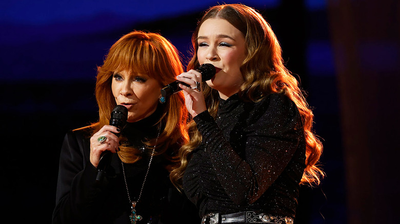 Aubrey Nicole and Reba McEntire perform on the live Season 28 finale of The Voice