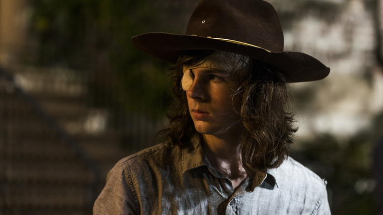 Chandler Riggs as Carl Grimes looks intense in The Walking Dead