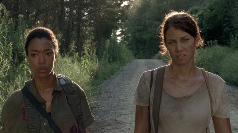 Sasha and Maggie walking down a road on The Walking Dead S5E10