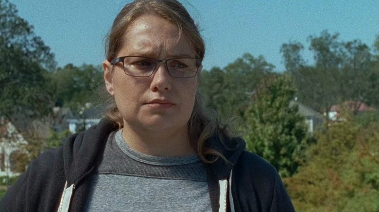 Denise knitting her brows and looking too her left on The Walking Dead S6E14