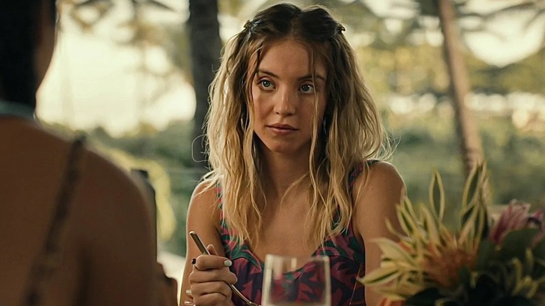 Olivia Mossbacher eating outdoors in The White Lotus