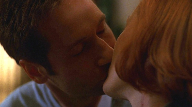 Mulder and Scully kiss on The X-Files