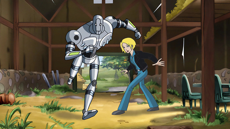 Zeta and Ro flee through an abandoned barn on the animated series, The Zeta Project.