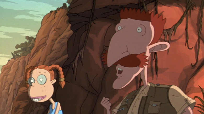 Eliza standing while Nigel Thornberry speaks