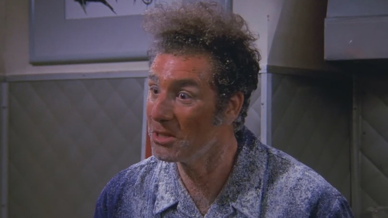 Kramer is upset because he's covered in oregano and parmesan