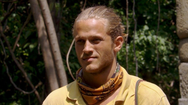 Matt Elrod with his hair pulled back during a challenge on Survivor: Redemption Island