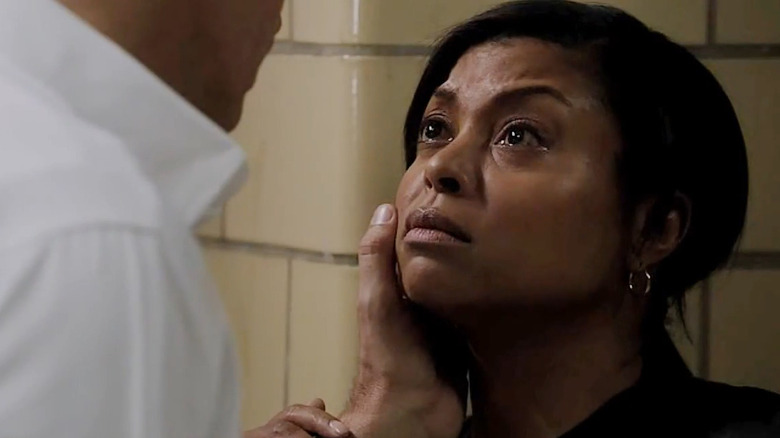 Joss Carter (Taraji P. Henson) with tears in her eyes looking up at John Reese (Jim Caviezel) on Person of Interest