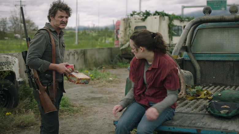 Pedro Pascal's Joel and Bella Ramsey's Ellie grab a snack in the Last of Us