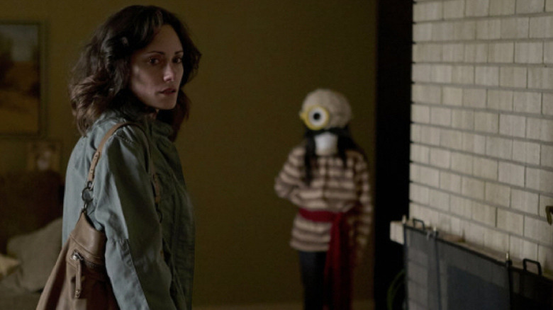 Natalie Brown as Jessica Yolen, standing in front of a child dressed as a pirate in Channel Zero.