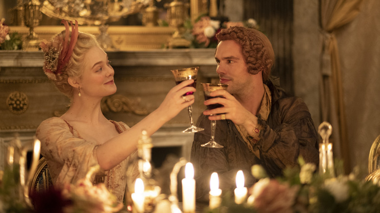 Catherine and Peter raising glasses