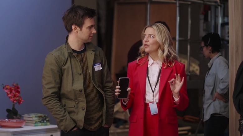 Cary Dubek listening to Brooke speak excitedly on The Other Two S2E2