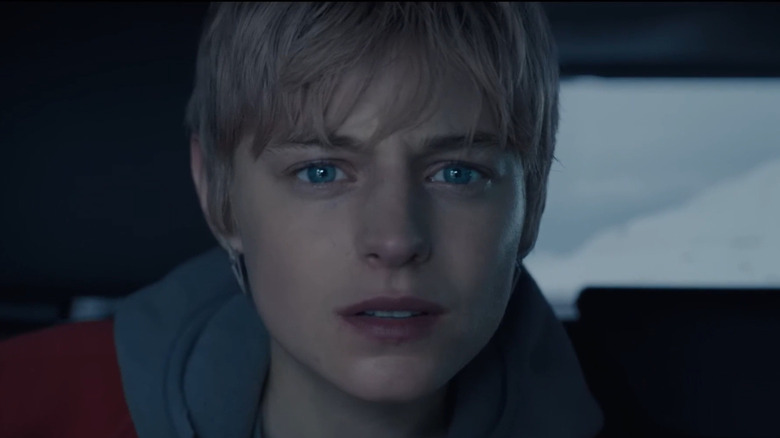 Darby Hart (Emma Corrin) takes a car ride to nowhere in A Murder at the End of the World