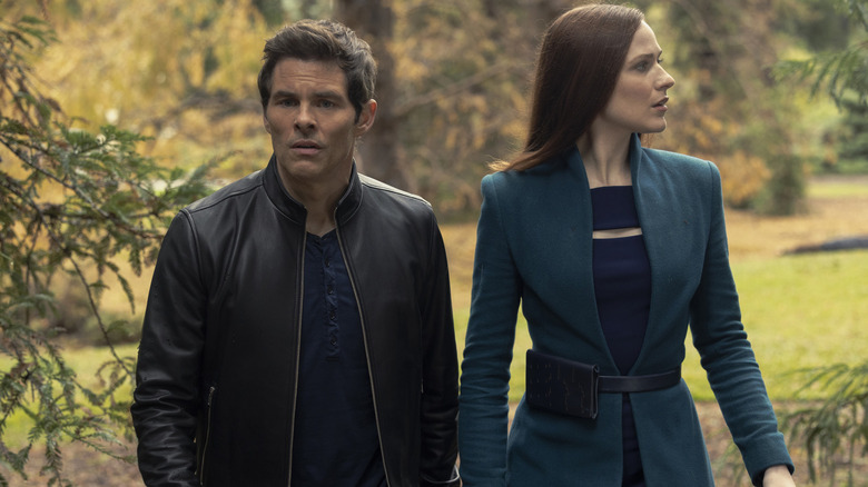 Teddy (James Marsden) and Dolores (Evan Rachel Wood) walk the woods in Westworld