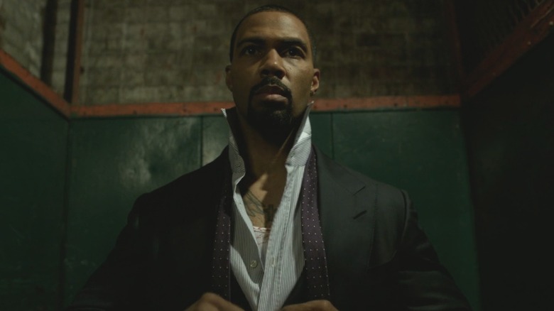 James (Omari Hardwick) dresses in an elevator in Power