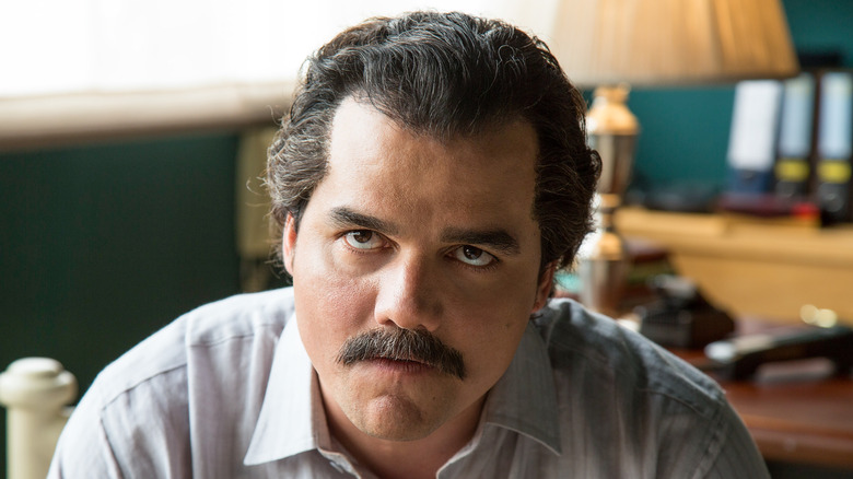 Pablo Escobar (Wagner Moura) hears some bad news in Narcos