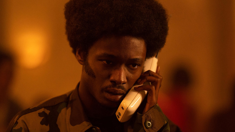 The RZA (Ashton Sanders) takes a phone call in Wu-Tang: An American Saga